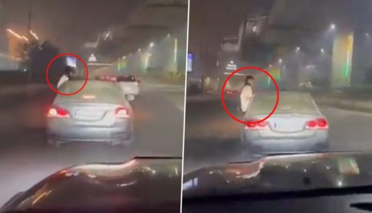 Video: Woman Performs Stunt Inside Moving Car in Noida; Police Assure Action After Act Caught on Camera