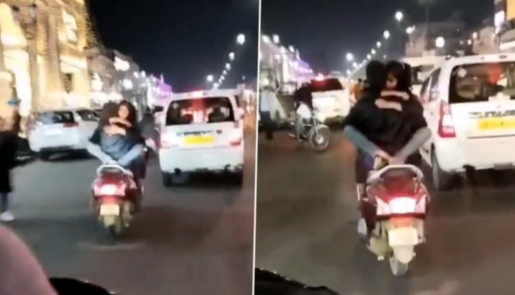 Uttar Pradesh: Lucknow Couple's Indecent Stunts On Moving Two-Wheeler on Busy Road Goes Viral, Probe Launched (Watch Video)