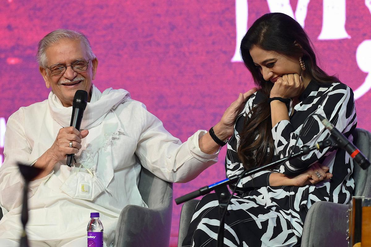 In this picture taken on January 10, 2023, Indian urdu poet, lyricist and screenwriter Gulzar (L) and actress Tabu attend a promotional event of their upcoming Indian Hindi-language action thriller film 'Kuttey' in Mumbai. (Photo by SUJIT JAISWAL / AFP)