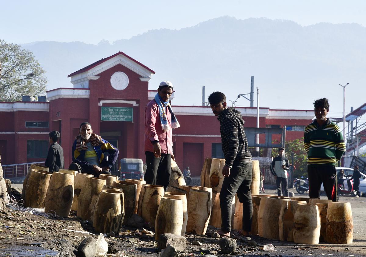 Residents of Dholak Basti handcraft drums near the Haldwani railway station.