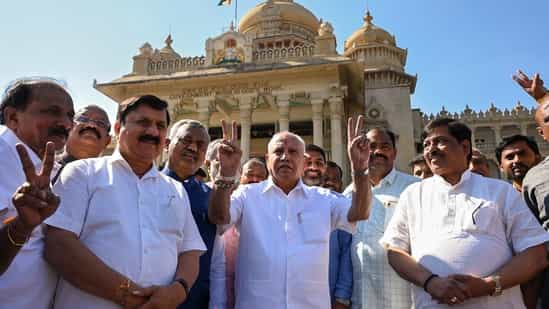 Former Karnataka chief minister B.S. Yediyurappa flashes victory sign after attending the last day of the Karnataka Assembly Session, in Bengaluru on Friday. (PTI Photo)