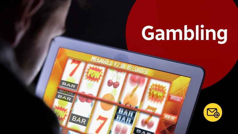 An anonymous person looking at a computer screen with a slot machine on it.