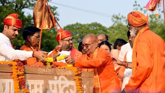 In Turahalli, there was a pandal dotted with saffron flags and yellow marigold flowers and those distributing them sported saffron scarves around their neck. (ANI Photo/For representation)(Nitin Lawate)