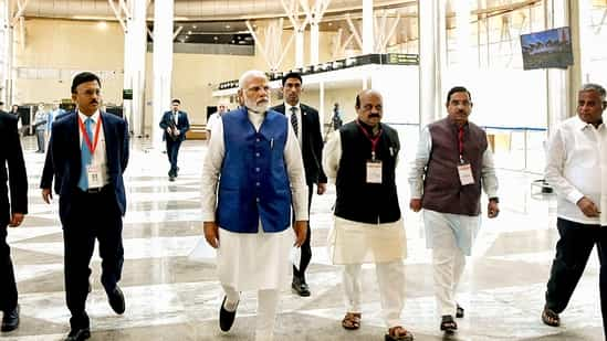 PM Modi with Karnataka CM Bommai and others during the inauguration of the Shivamogga Airport on Monday. (PTI Photo)