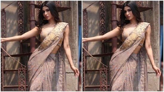 Mouni teamed her saree with a matching blouse of the same print with a plunging neckline and slip sleeves. “If I were a girl in a book, it would all be sooo easy,” Mouni captioned her pictures and called herself “a saree girl forever.” (Instagram/@imouniroy)