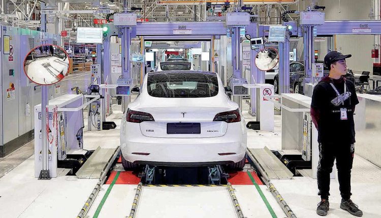 Is Tesla penalizing Chinese workers? They think so