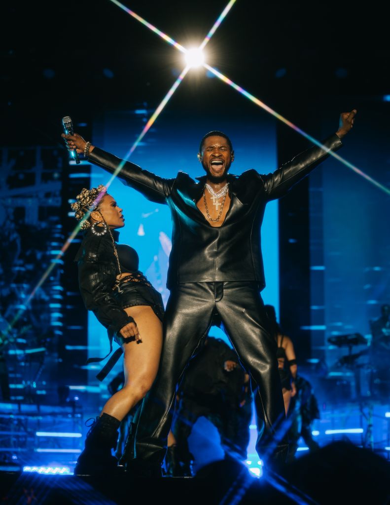 Usher performing at Lovers & Friends 2023.