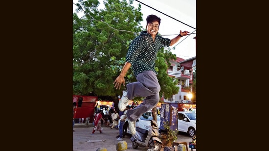 Kush Kumar, a student of Ramjas College, can’t contain his excitement when shopping at Gaffar Market. (Photo: Gokul VS/HT)