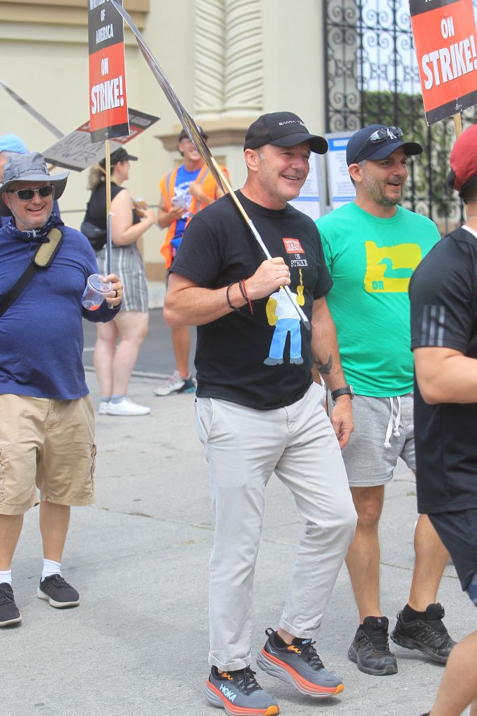 Clark Gregg walks the picket line in support of the SAG-AFTRA and WGA strike in Los Angeles, California. (Photo by BLW Media/Star Max/GC Images)