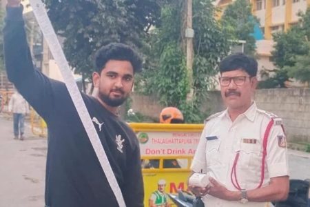 Bengaluru police catches a biker with 40 traffic cases, makes him clear dues | Bengaluru