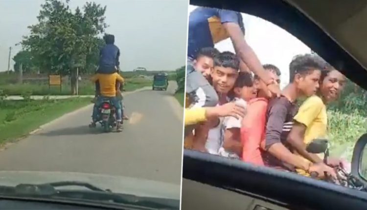 Human Pyramid on Bike in Uttar Pradesh: Seven Youths Ride Two-Wheeler With One Sitting on Pillion Rider’s Shoulder in Hapur, Video Raises Safety Concerns
