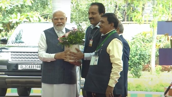 PM Modi being welcomed by ISRO Chairman S. Somanath upon his arrival to meet ISRO scientists following the successful soft landing of Chandrayaan-3 on the surface of the Moon in Bengaluru.(PTI)