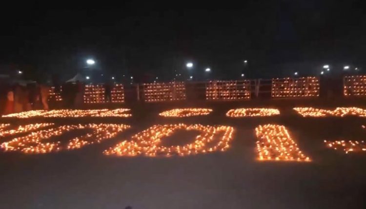 BJP Workers Light Earthen Lamps at Veterinary College Field in Guwahati to Welcome PM Narendra Modi (Watch Video)