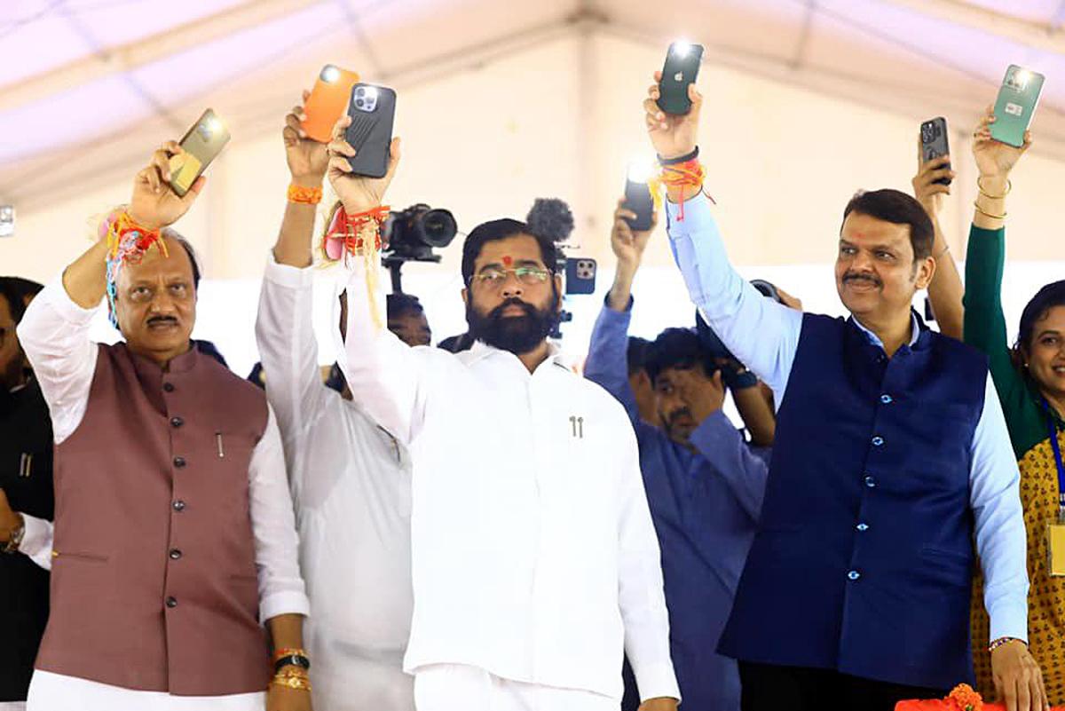 Maharashtra Chief Minister Eknath Shinde, State Deputy Chief Ministers Devendra Fadnavis and Ajit Pawar during the launch of ‘Majhi Ladki Baheen Yojana’, in Yavatmal, Maharashtra recently. File photo