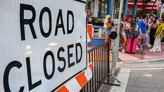 College kids transform Miami Beach's main seaside drag into a huge street party. (AFP)