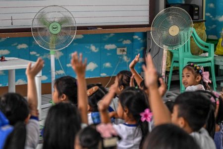 Early holiday, more fans: Philippines’ schools adapt to climate change