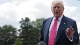 U.S. President Donald Trump speaks to the media as he departs the White House on July 15, 2025 in Washington, DC. 
