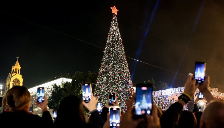 Bethlehem Christmas tree lit up for first time since start of Gaza war