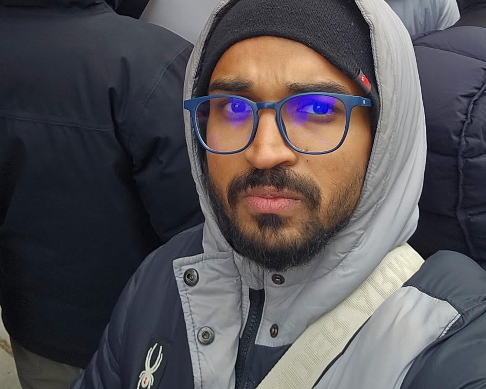 Ankit Patel attends a protest in Toronto