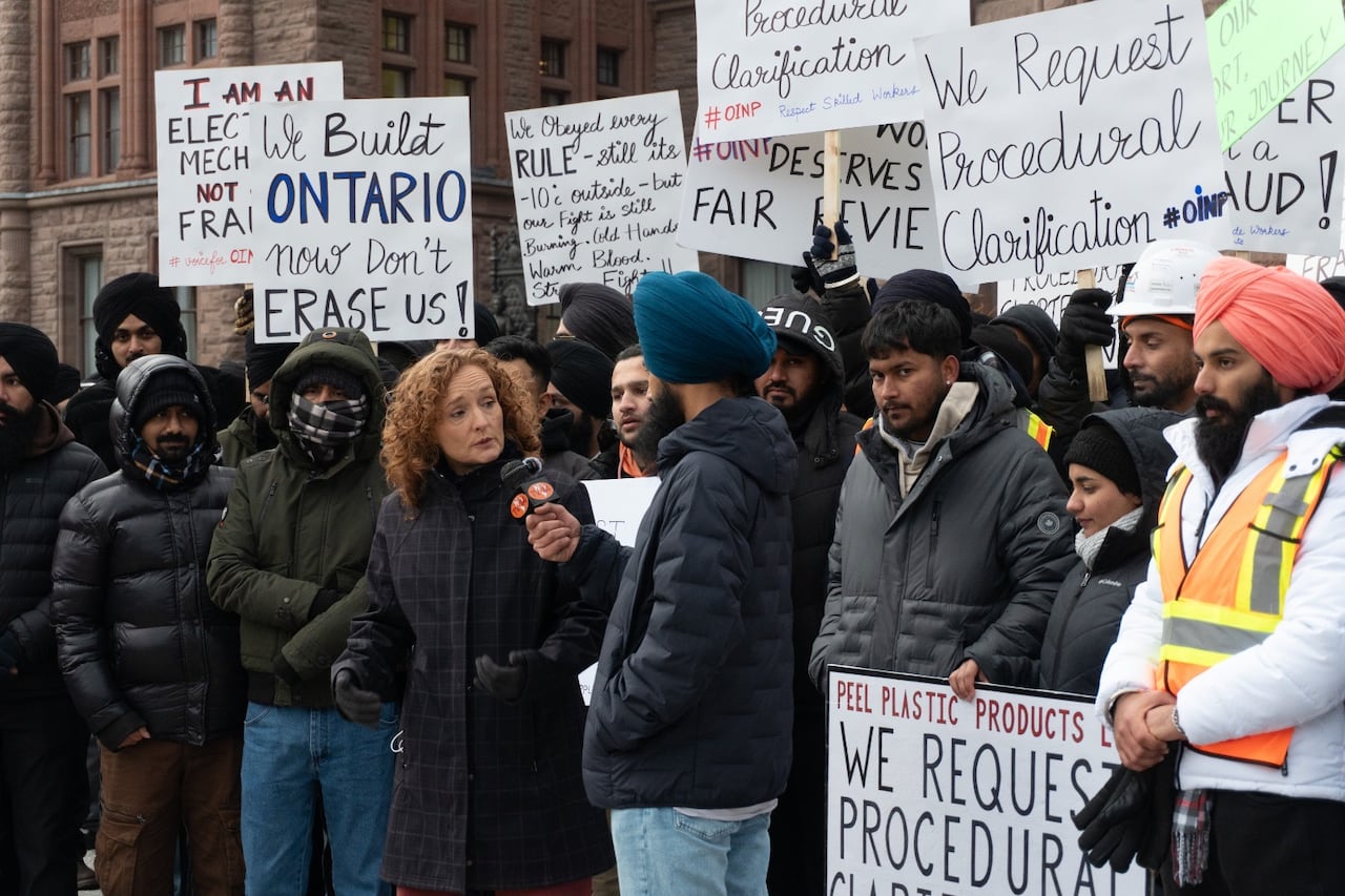A woman at the center of a protest.