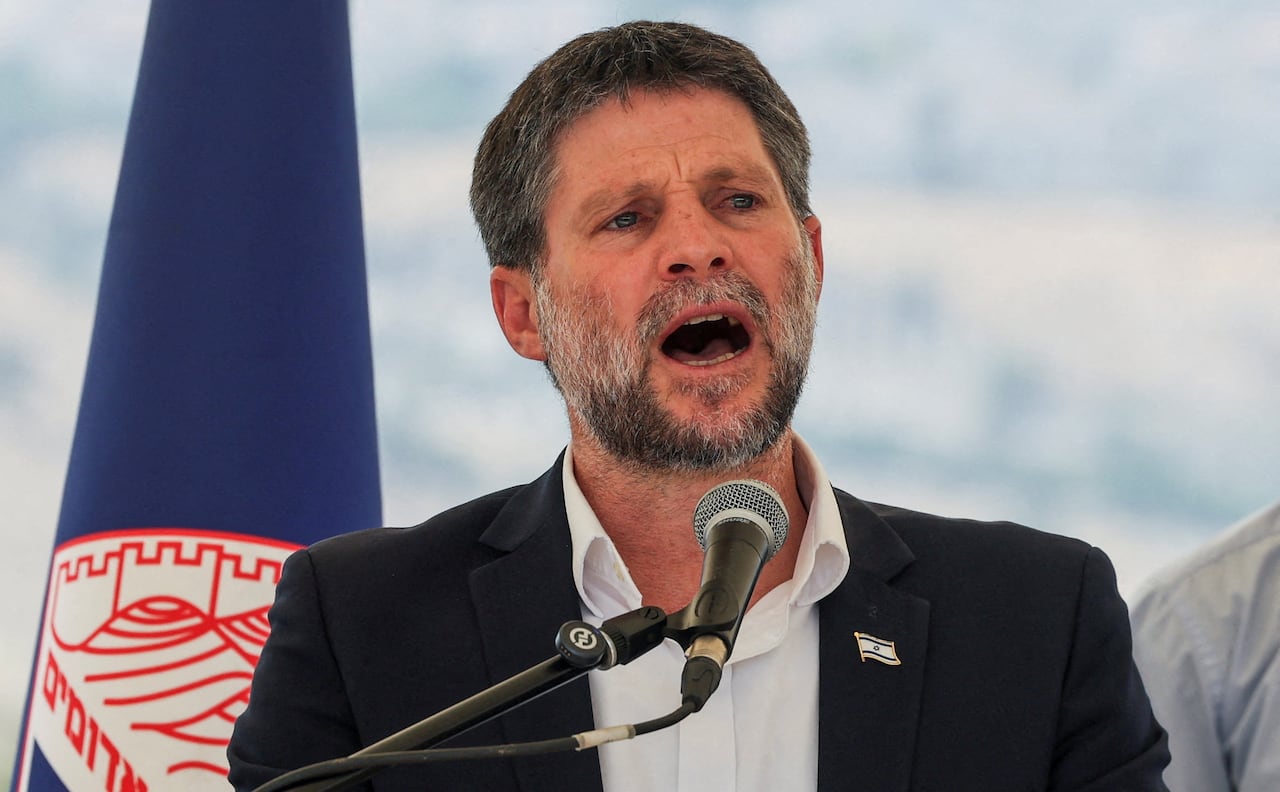 A man speaks at a news conference.